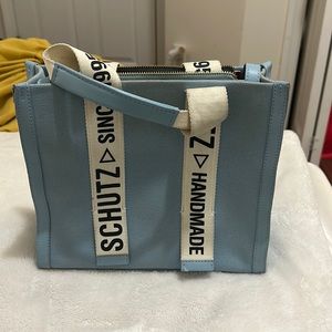 Schütz like new blue bag